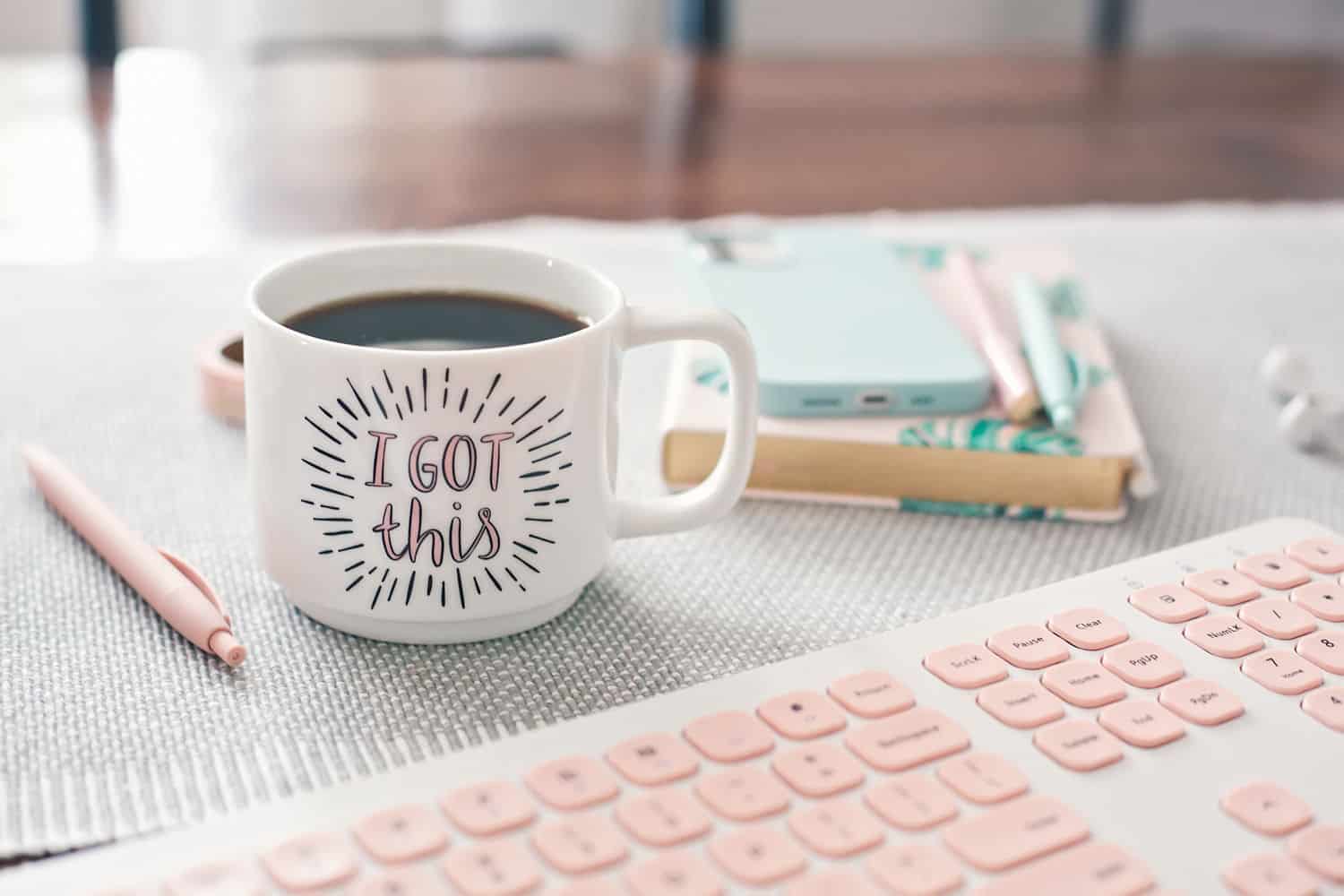 Mug that says "I got this" and a pink keyboard