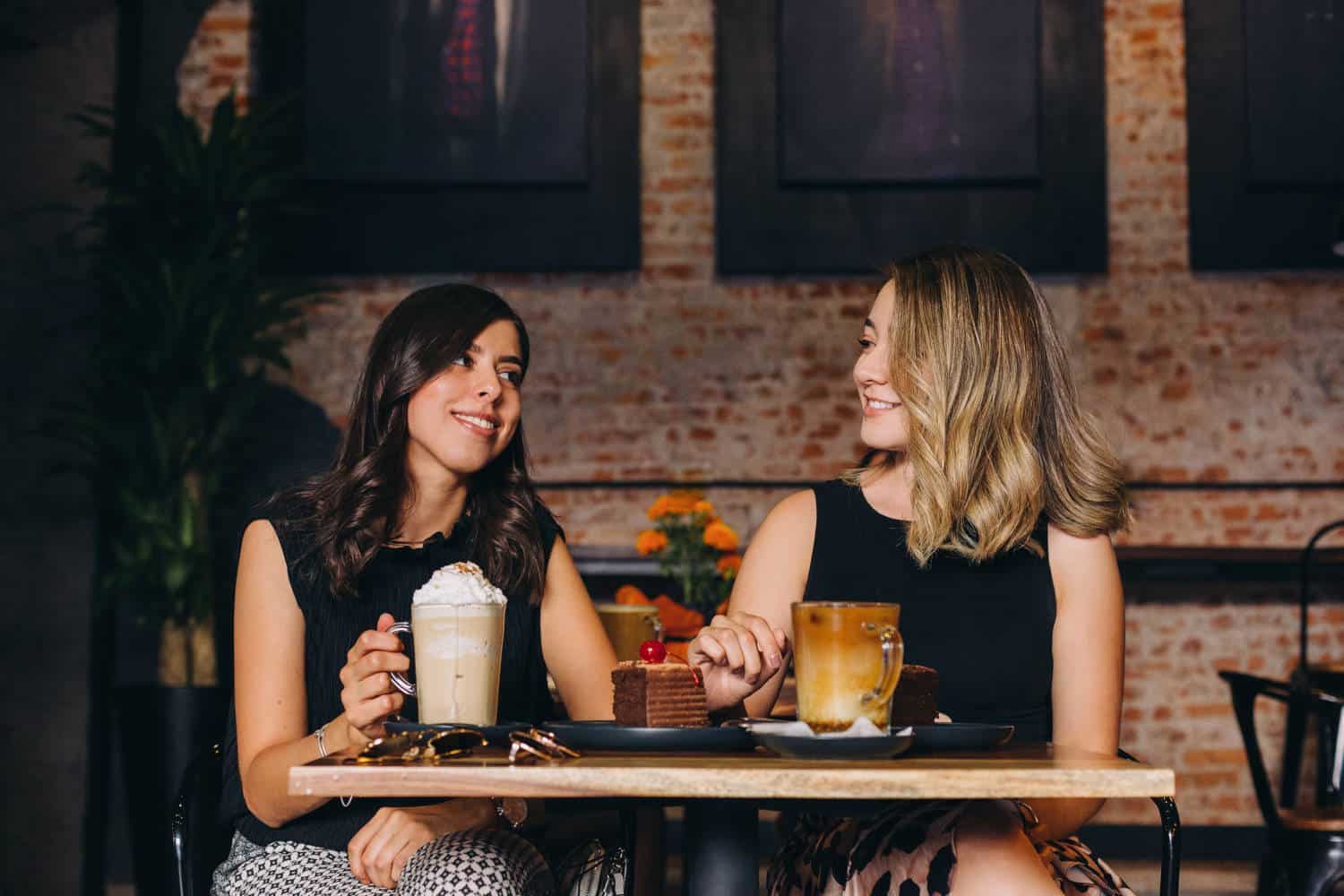 Two women sitting at a cafe